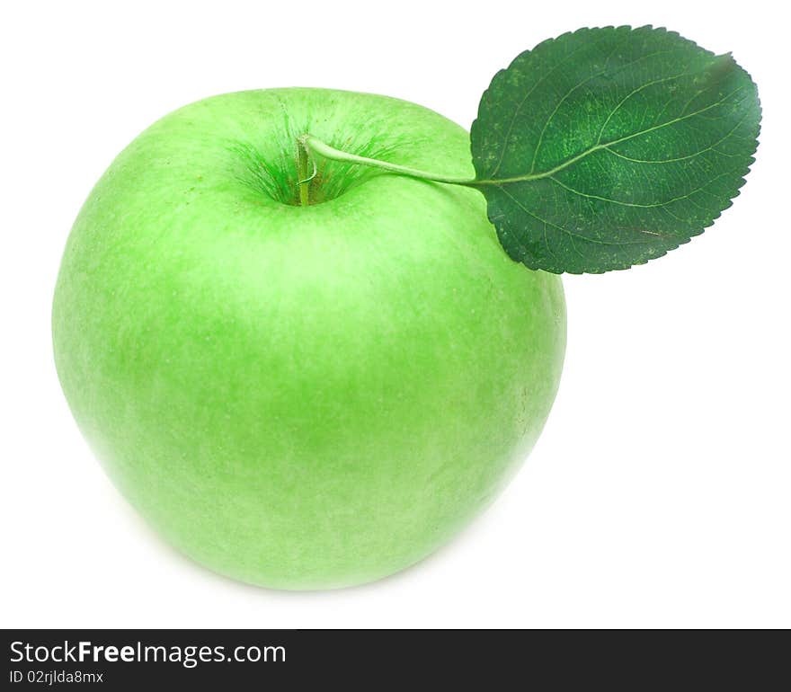 Ripe green apple with green leaf. Isolated on white background.