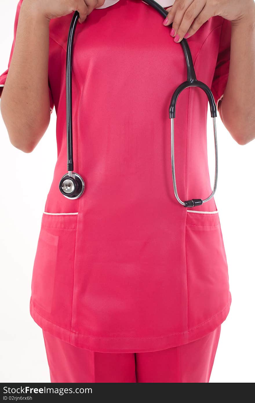 A female nurse holding stethoscope. A female nurse holding stethoscope