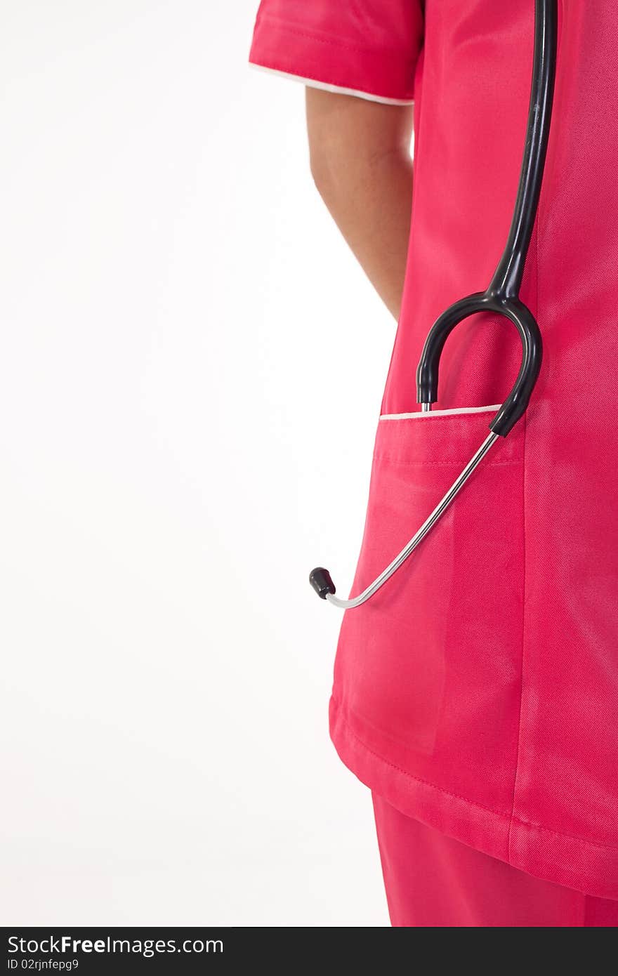 Stethoscope inside nurse uniform pocket. Stethoscope inside nurse uniform pocket