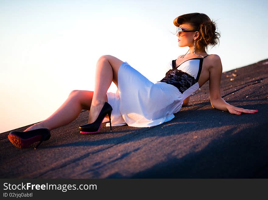 Girl in white dress and in sunglasses. Girl in white dress and in sunglasses