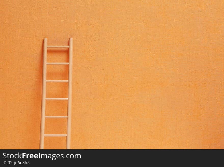 Conceptual background with wooden ladder against ginger wall. Conceptual background with wooden ladder against ginger wall