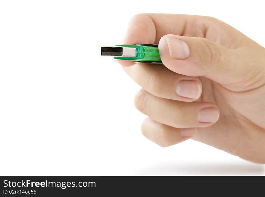 Usb flash in the hand isolated on white