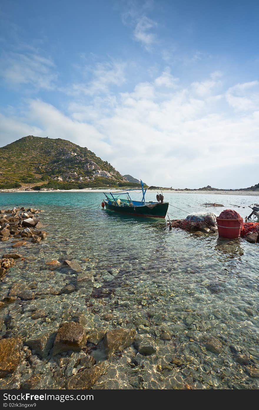 An old boat in the Gulf of Punta Molentis, Sardinia, Italy. An old boat in the Gulf of Punta Molentis, Sardinia, Italy