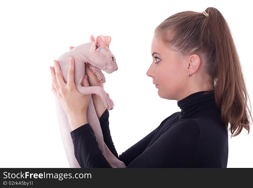 Beautiful young woman with a cat on a white background