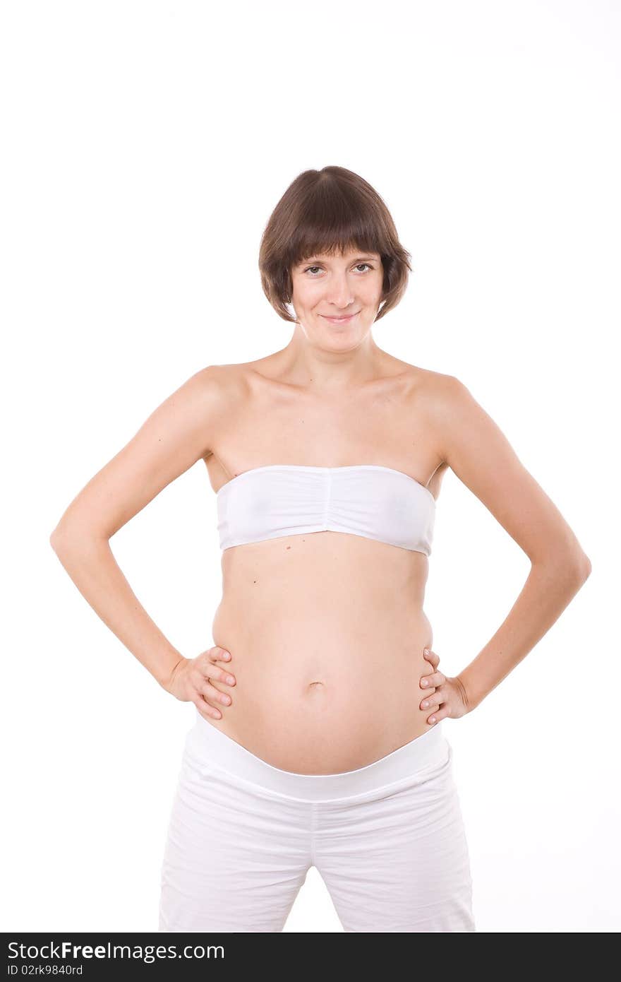 Portrait of pregnant woman in studio