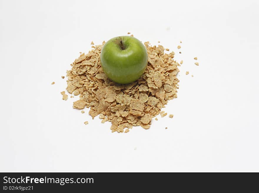 Green apple and golden cereals