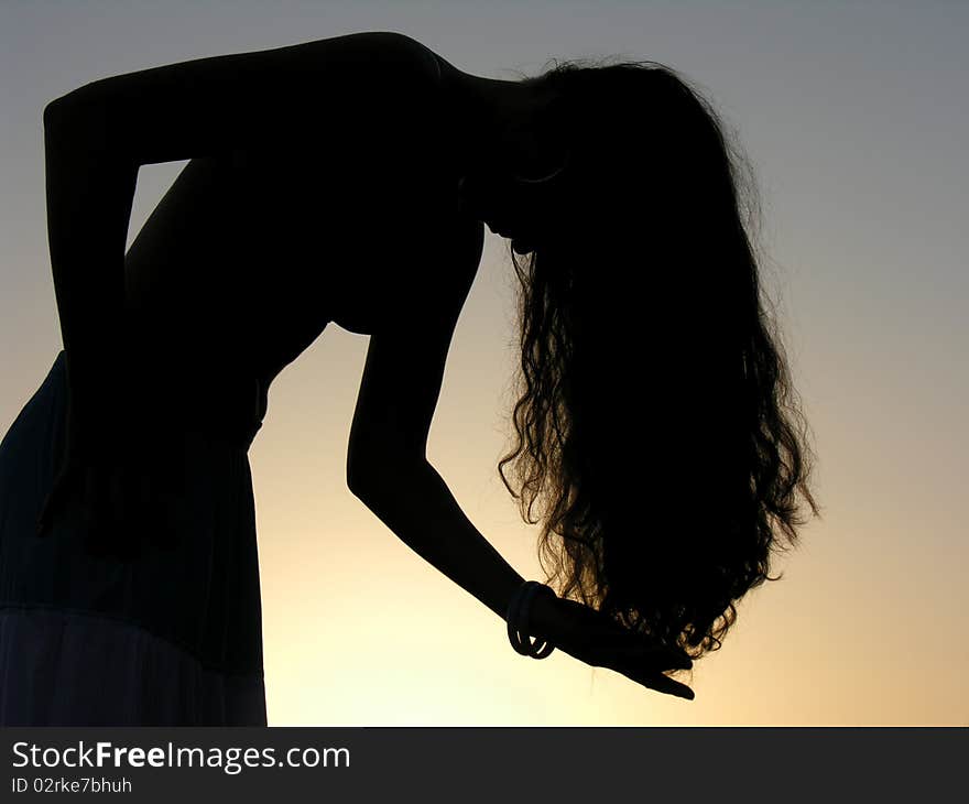 Profile of the young woman. Profile of the young woman