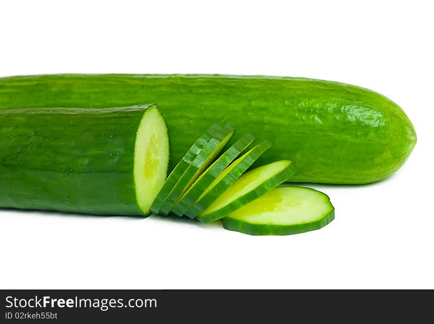 Two Cucumbers And Slices Isolated