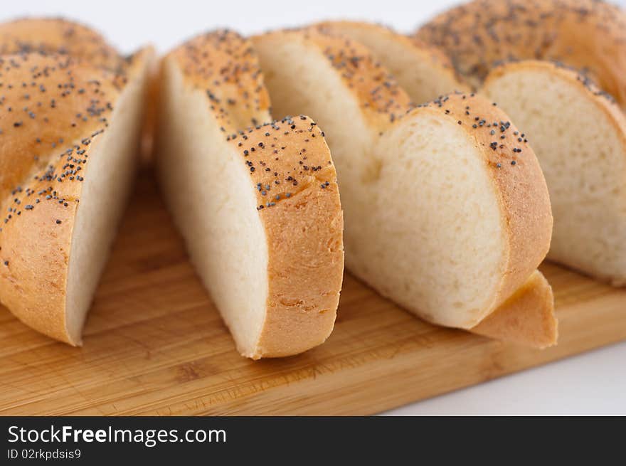 Bread slices on board close up. Bread slices on board close up.