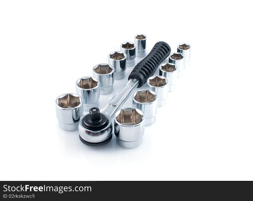 Set of chromeplated wrenches, on a white background