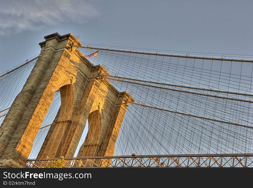 The Brooklyn bridge photograped at sunrise. This is an HDR composite of three exposures