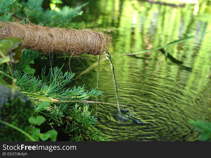 The source on background of water from waves. The source on background of water from waves