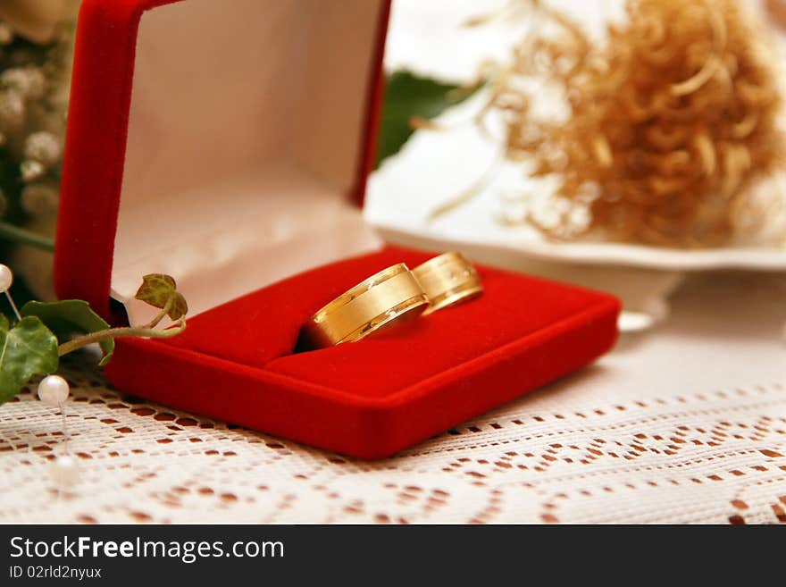 Female and male gold wedding rings