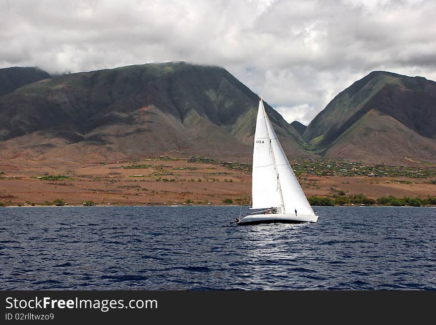 Sailboat on beautiful Maui Hawaiian Island ocean