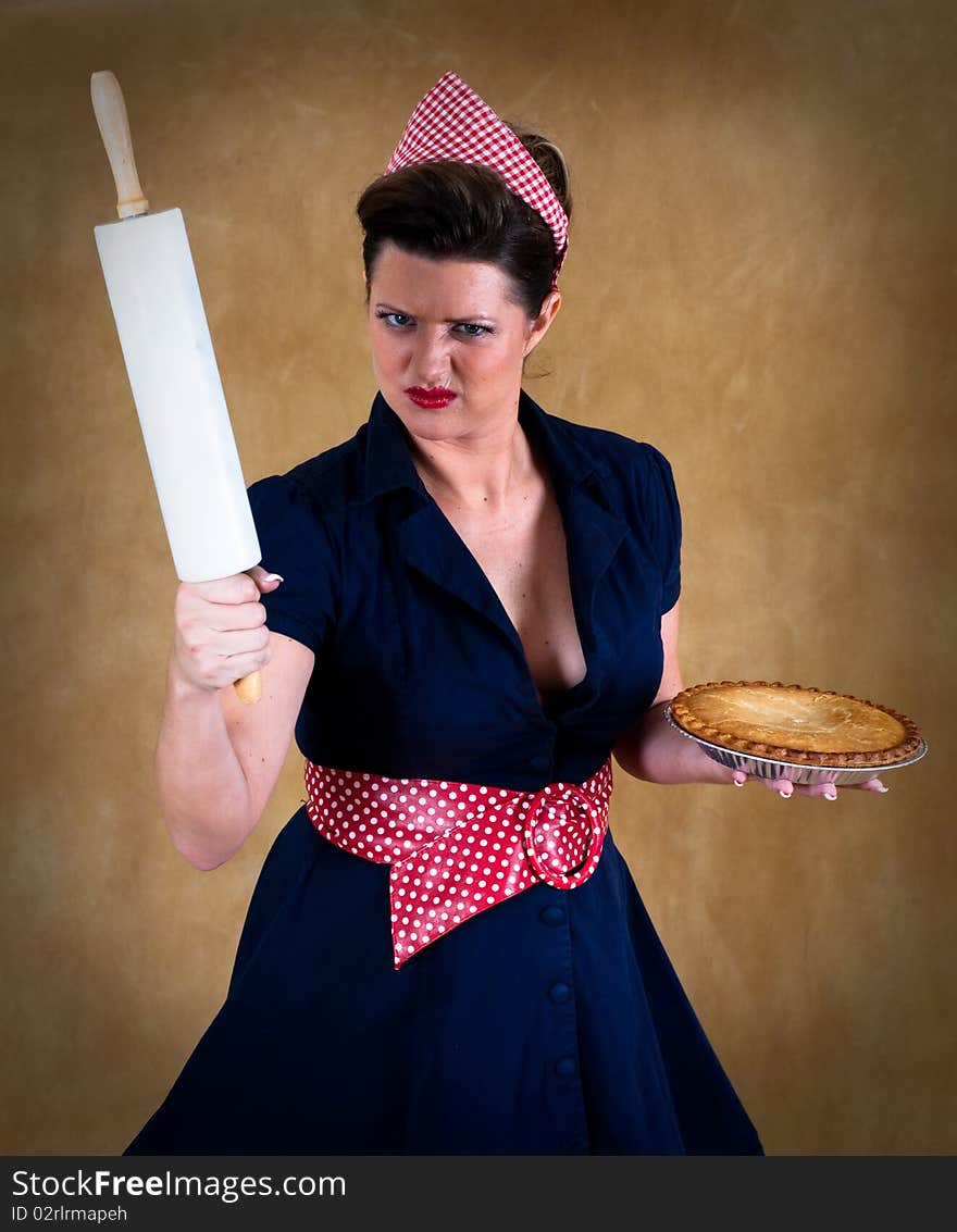 House wife with the pie in her hands. House wife with the pie in her hands