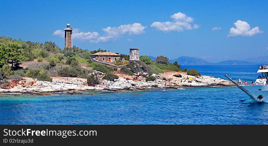 Lighthouse at coast in greek island