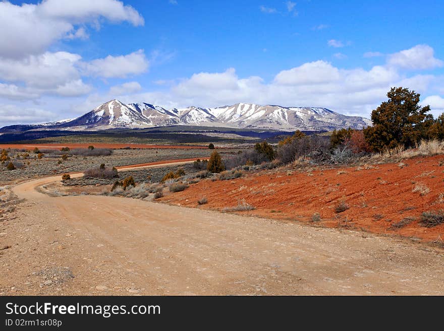 Country road with beautiful landscapes on background,Utah,USA