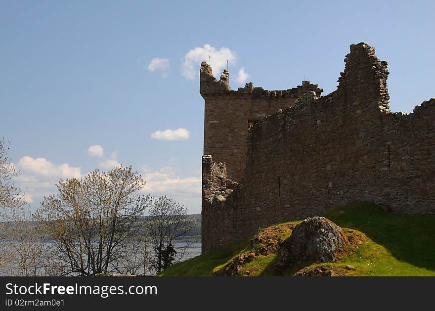 Urquhart Castle located on the shore of Loch Ness in Scotland. Urquhart Castle located on the shore of Loch Ness in Scotland