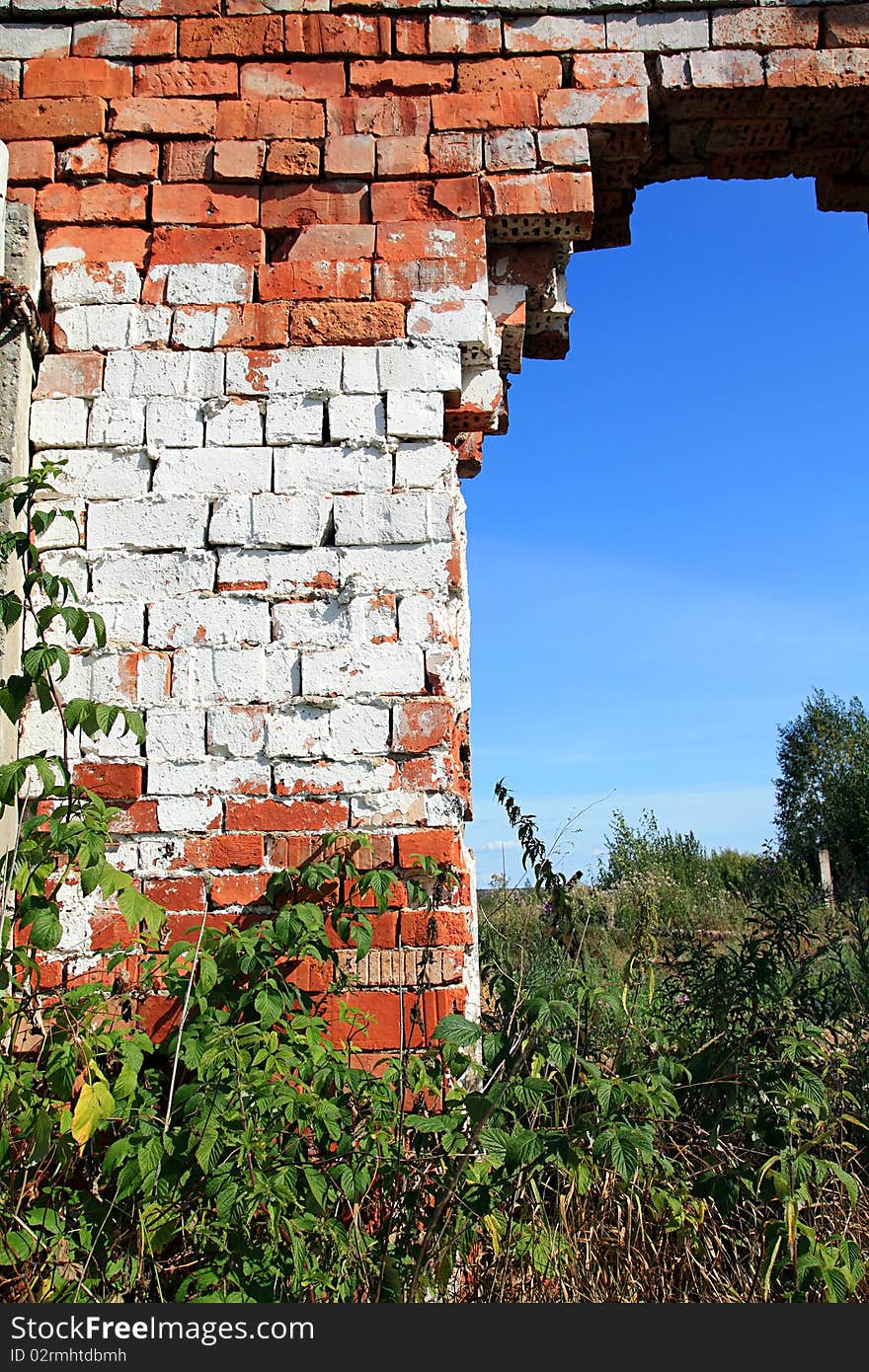 Aging brick wall on celestial background