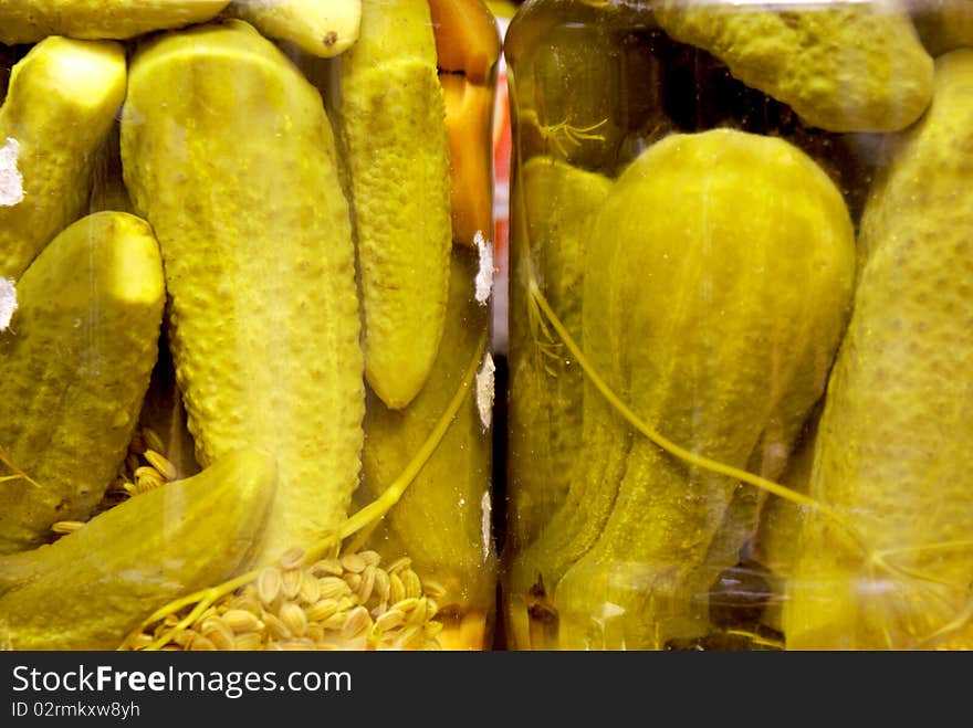 Pickles in an acidic brine