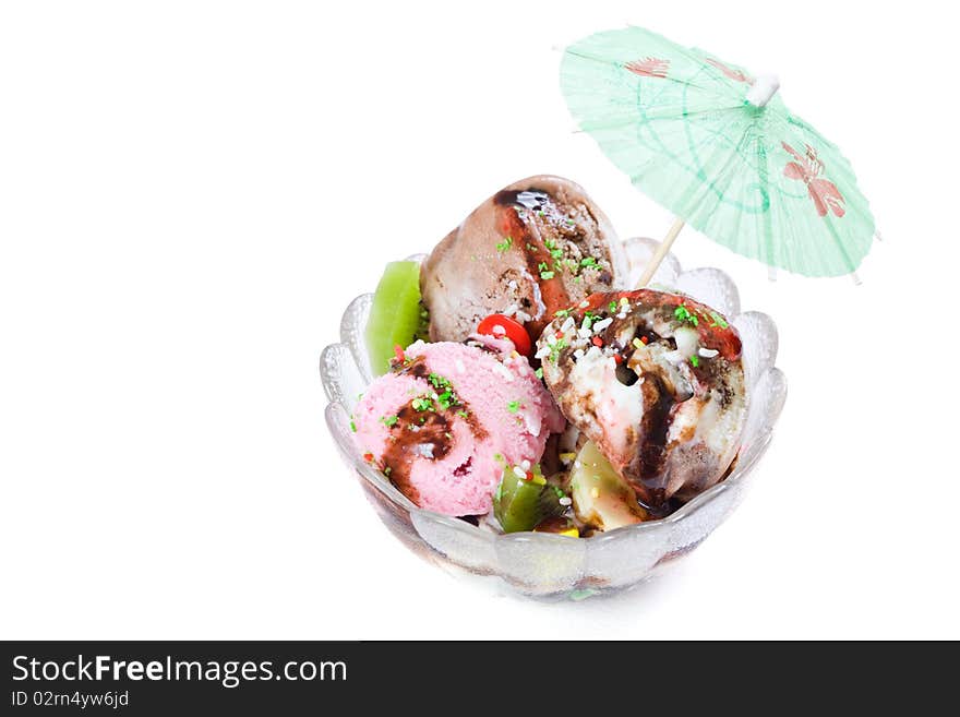 Glass cup full with fresh ice cream on white background