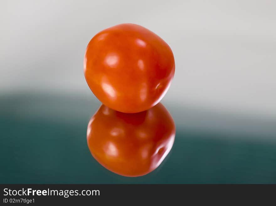 Juicy Isolated Tomato.reflection.mirror