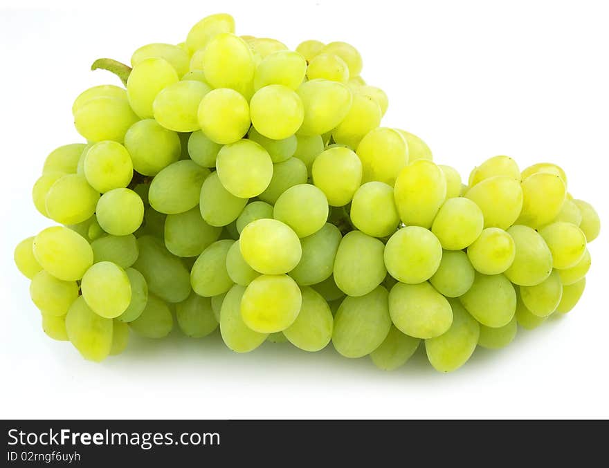 Cluster of white grapes close up on a white background