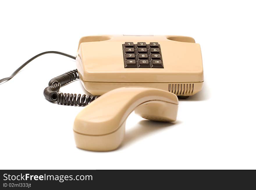 Old telephones with removed receiver isolated on a white background. Old telephones with removed receiver isolated on a white background.