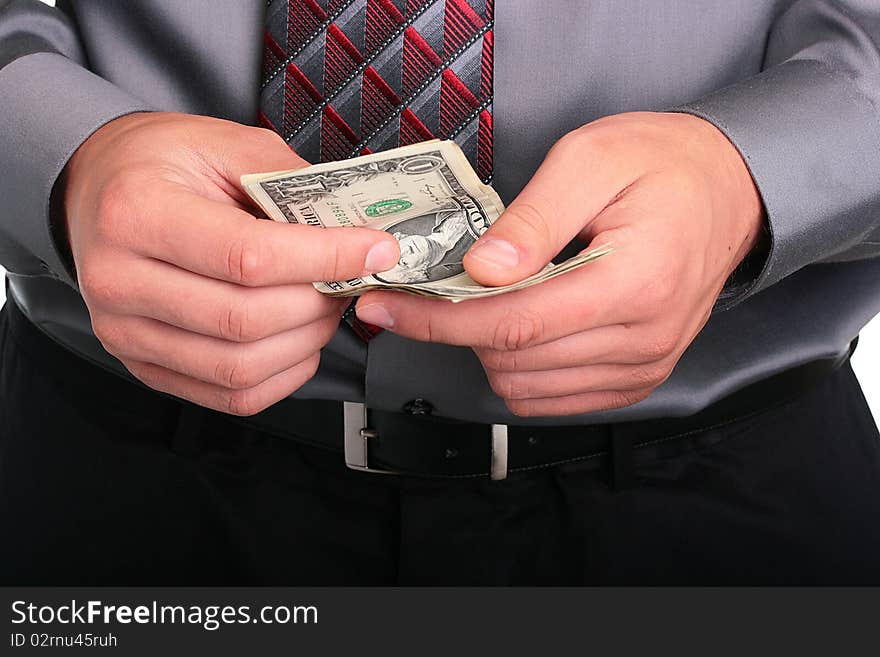 The businessman in a grey shirt and a tie has control over money. The businessman in a grey shirt and a tie has control over money.