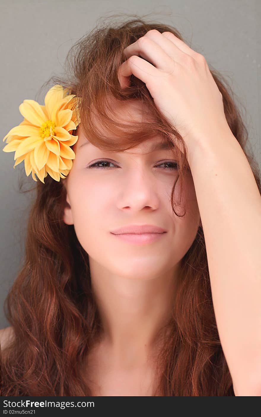 Girl with yellow flower in the head. Girl with yellow flower in the head