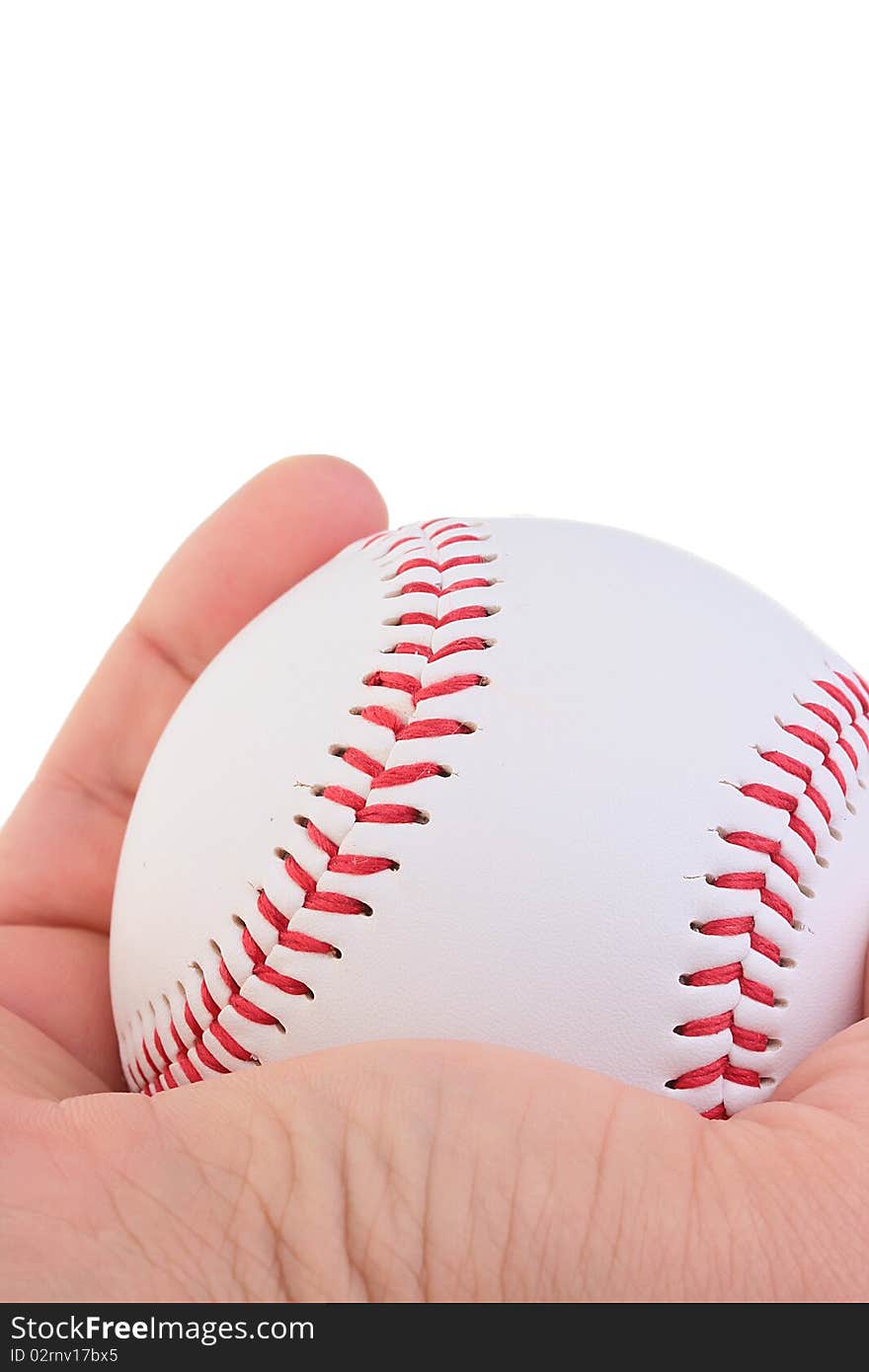 A man holding a white baseball with red stitching. Add your text to the background. A man holding a white baseball with red stitching. Add your text to the background.