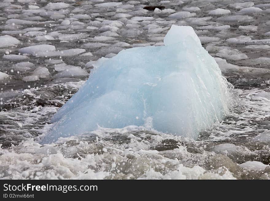 Iceberg floating in Arctic waters