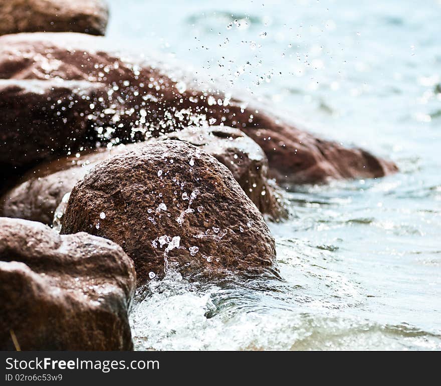 Stones On The Shore Of A Lake