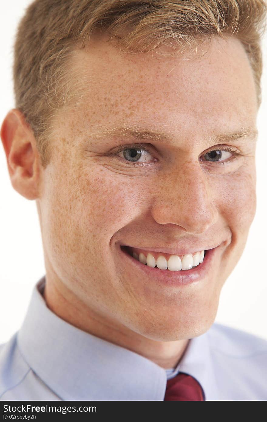 Young businessman smiling