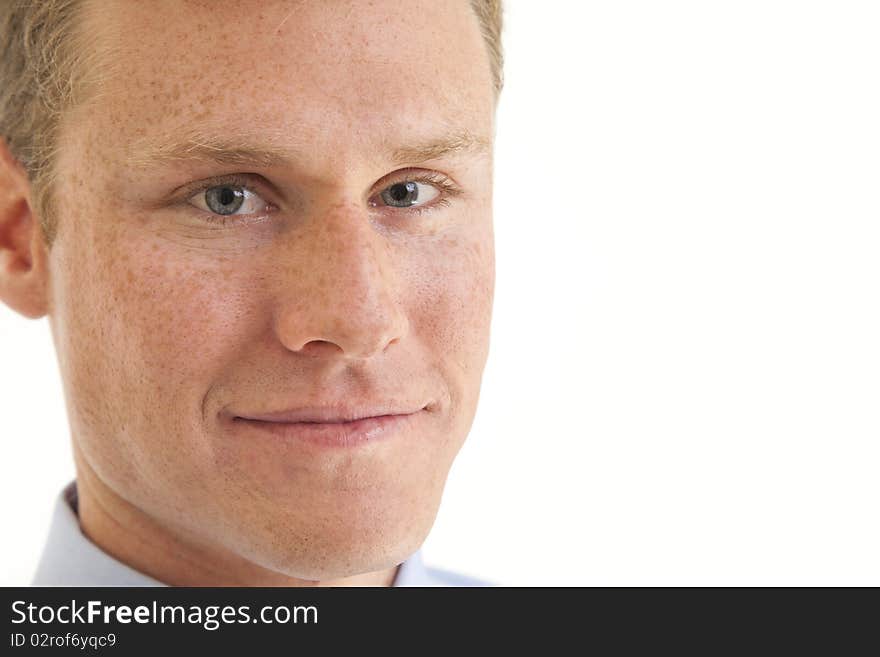 Portrait of confident young businessman smiling