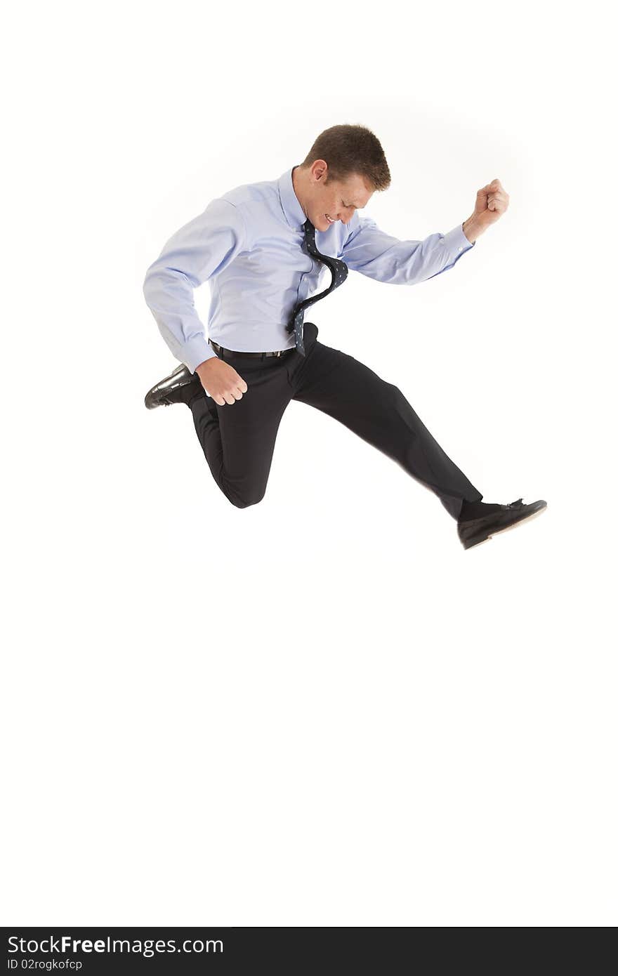 Young businessman jumping in the air