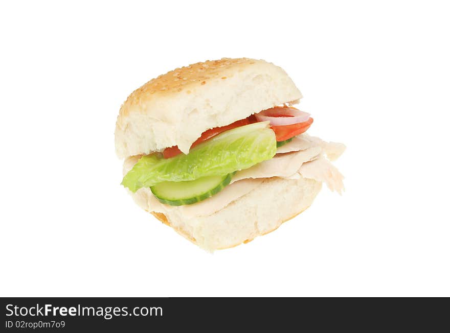 Chicken and salad bread roll isolated on white. Chicken and salad bread roll isolated on white