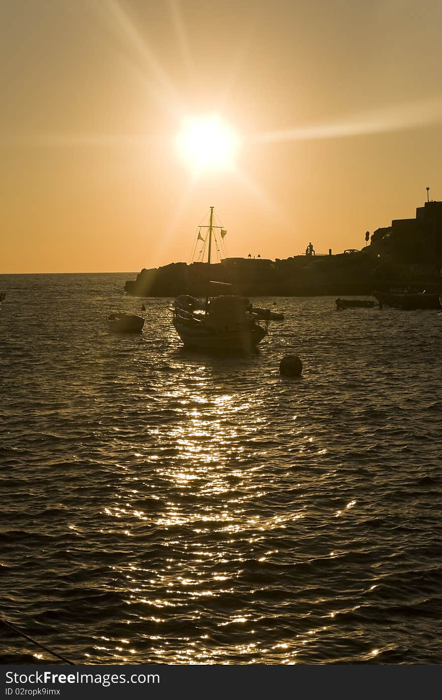 Sailing yatch in the sunset