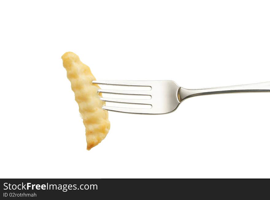 Crinkle cut chip on a fork