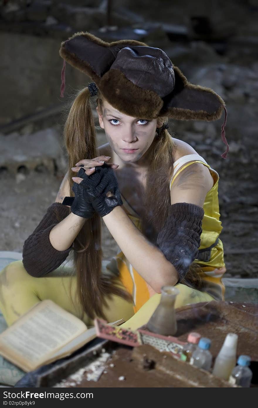 Photo of a chemist woman in a dark laboratory.