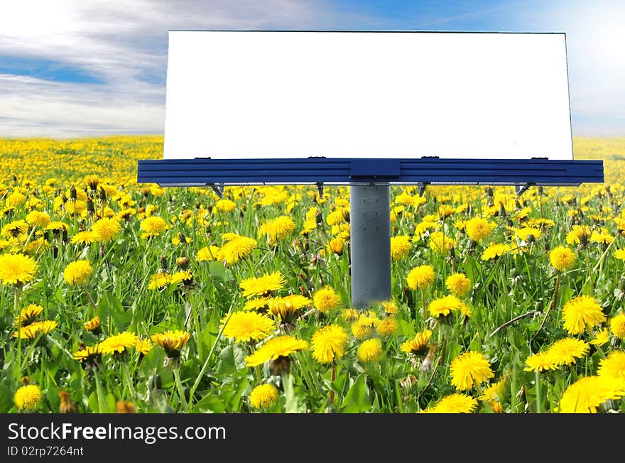 Big blank billboard with flowers