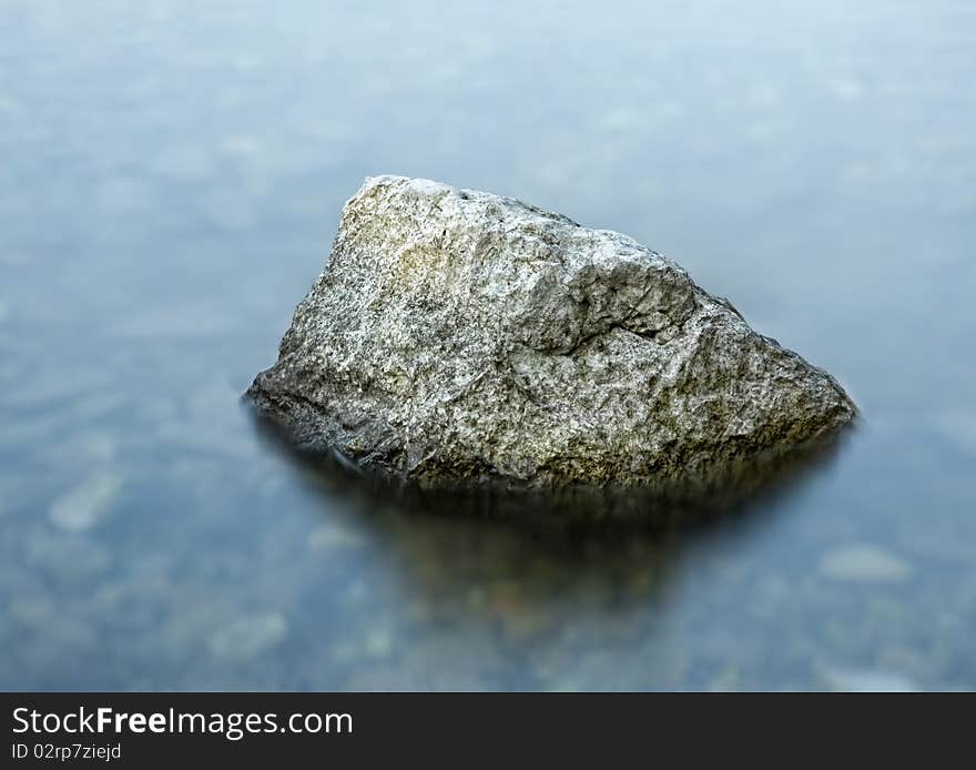 Isolated rock in the sea. Isolated rock in the sea