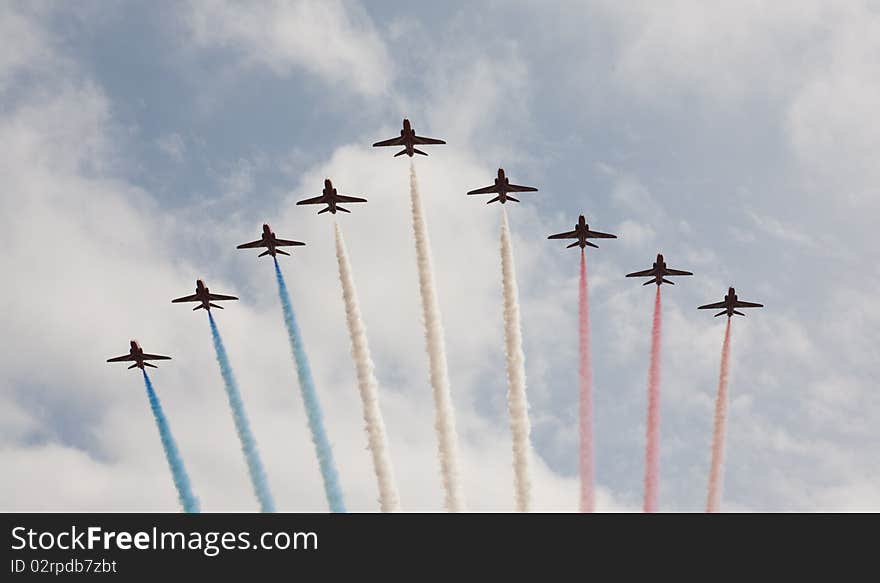 The world famous Royal air force Red arrows aerobatic flying team in action.