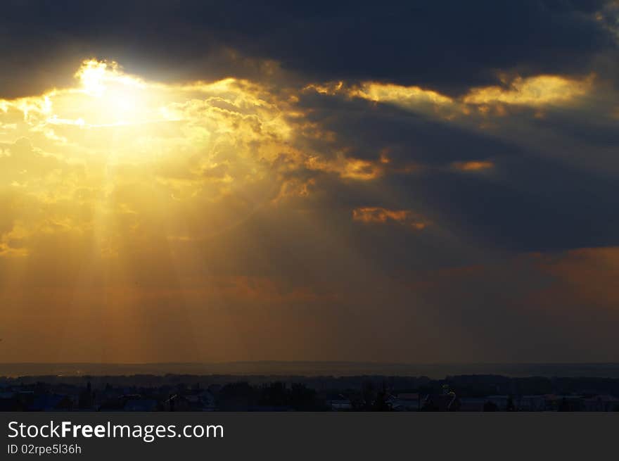 Sun behind the clouds