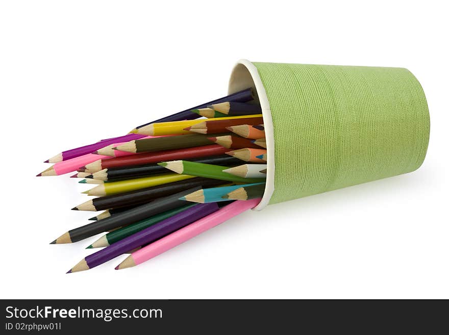 Isolated color pencils are in the glass on a white backround