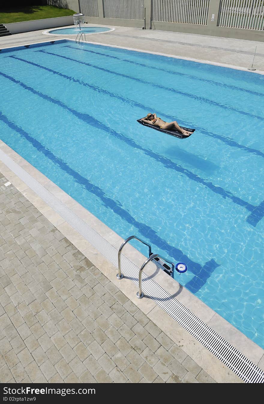 Woman relax on swimming pool