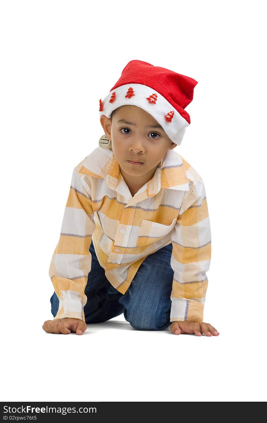 Cute boy with santa claus hat, isolated on white background