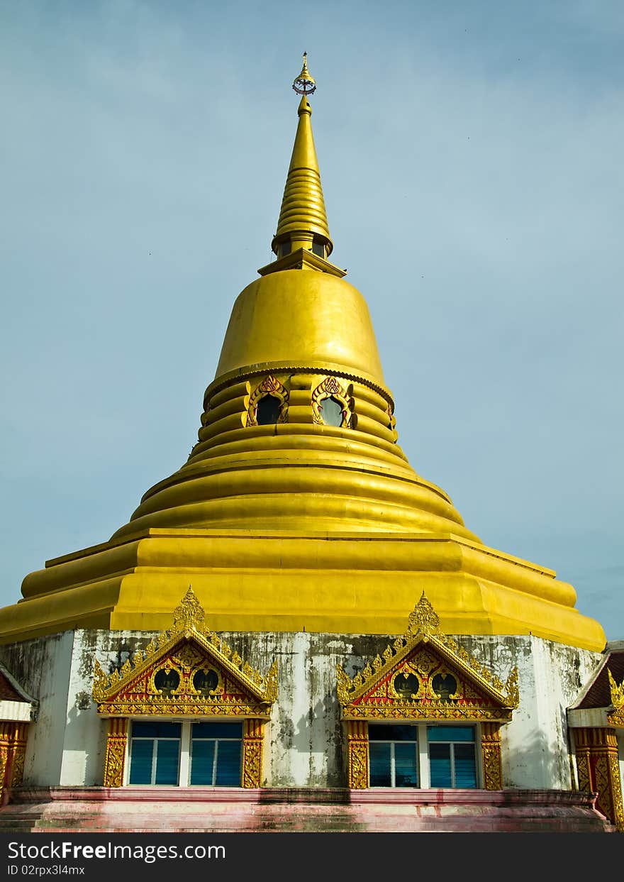 Golden pagoda in evening sky. Golden pagoda in evening sky