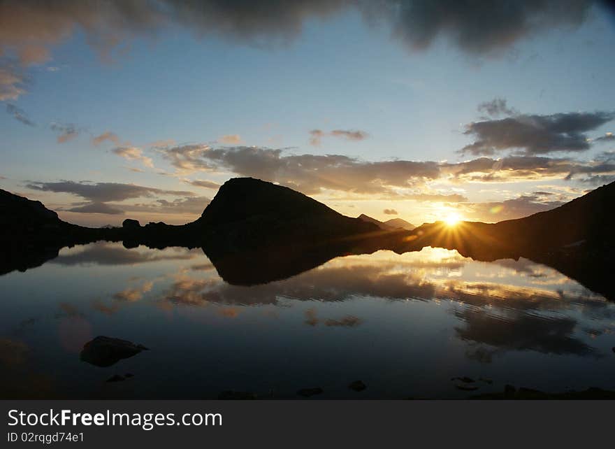 Sunrise on the mountain lake