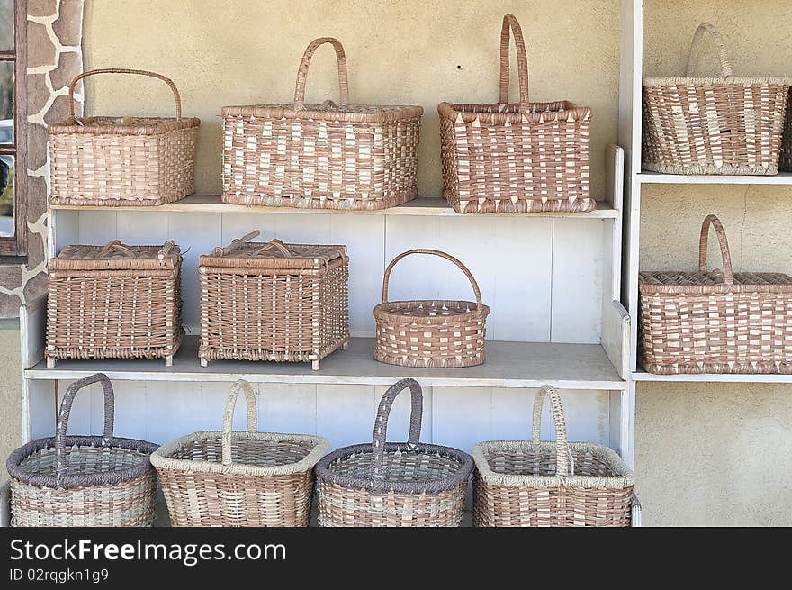 Shelves filled with baskets that is for sale